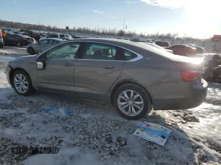 2018 Chevrolet Impala LT with VIN 2G1105SA7J9102631, listed as a Copart auction lot 88718675 with 106,861 mi miles and Salvage Title. Bid and sale history available at DreamBid. Image 2.