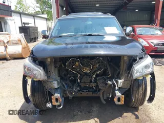 2015 Infiniti QX80 with VIN JN8AZ2NE5F9082021, listed as a IAAI auction lot 42257172 with 205,114 mi miles and . Bid and sale history available at DreamBid. Image 13.