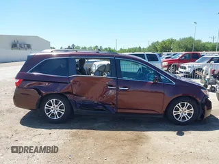 2011 Honda Odyssey EX with VIN 5FNRL5H42BB021438, listed as a IAAI auction lot 41978690 with 190,495 mi miles and . Bid and sale history available at carsss.com. Image 14.