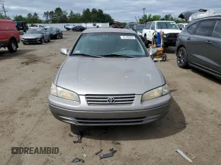 1999 Toyota Camry LE с VIN 4T1BG22K6XU404532, выставлен на аукционе Copart как лот 57449655 с пробегом 173 587 миль миль и Списание • Salvage title. История ставок и продаж доступна на DreamBid. Изображение 5.