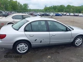 2002 Saturn SL z VIN 1G8ZK52762Z131497, wystawiony jako IAAI lot #42086108 z przebiegiem 119 273 mil mil oraz . Historia ofert i sprzedaży dostępna na DreamBid. Obrazek 6.