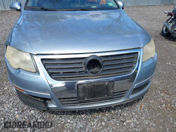 2006 Volkswagen Passat Value Edition z VIN WVWAK73C06P141096, wystawiony jako IAAI lot #42297811 z przebiegiem 84 399 mil mil oraz . Historia ofert i sprzedaży dostępna na DreamBid. Obrazek 6.