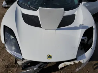 2014 Lotus Evora 2+2 z VIN SCCLMDTU5EHA10041, wystawiony jako Copart lot #45947345 z przebiegiem 26 179 mil mil oraz Szkody całkowita. Historia ofert i sprzedaży dostępna na DreamBid. Obrazek 12.