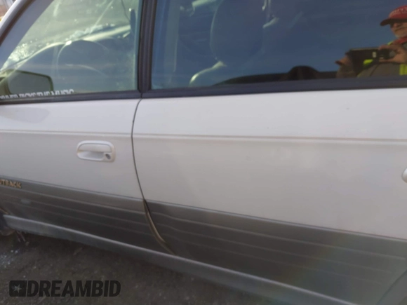 2003 Subaru Legacy Outback Limited with VIN 4S3BH686137610336, listed as a IAAI auction lot 41345221 with 254,353 mi miles and . Bid and sale history available at DreamBid. Image 14.
