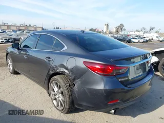 2015 Mazda 6 i Grand Touring with VIN JM1GJ1W55F1220578, listed as a IAAI auction lot 42076034 with 77,904 mi miles and . Bid and sale history available at carsss.com. Image 3.