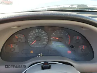 2003 Ford Mustang Standard z VIN 1FAFP40463F327722, wystawiony jako Copart lot #55042765 z przebiegiem 117 010 mil mil oraz Szkoda całkowita • Salvage title. Historia ofert i sprzedaży dostępna na DreamBid. Obrazek 9.