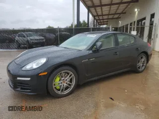 2015 Porsche Panamera S E-Hybrid z VIN WP0AD2A7XFL040092, wystawiony jako Copart lot #85878734 z przebiegiem 89 354 mil mil oraz Tytuł czysty. Historia ofert i sprzedaży dostępna na DreamBid. Obrazek 1.