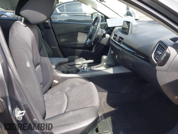 2015 Mazda Mazda3 i Touring with VIN 3MZBM1V74FM157512, listed as a IAAI auction lot 41844549 with 77,787 mi miles. Bid and sale history available at carsss.com. Image 5.