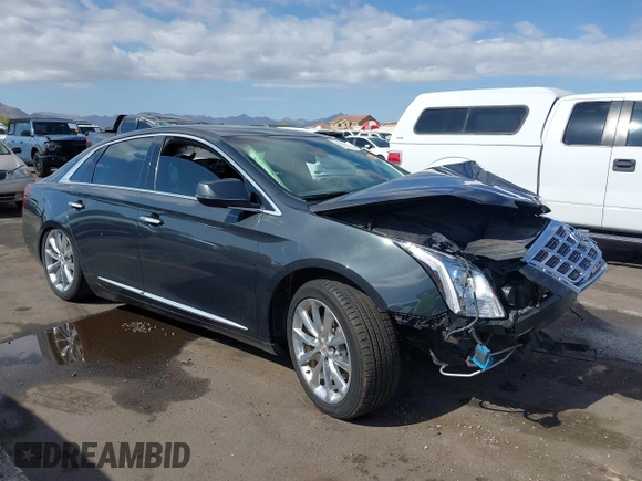 2013 Cadillac XTS Luxury with VIN 2G61P5S31D9182553, listed as a IAAI auction lot 42076227 with 116,849 mi miles and . Bid and sale history available at DreamBid. Image 1.