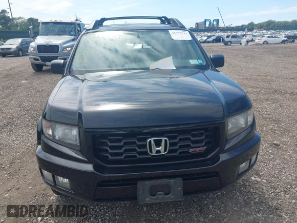 2014 Honda Ridgeline Sport with VIN 5FPYK1F71EB003710, listed as a IAAI auction lot 42777931 with 126,755 mi miles and . Bid and sale history available at DreamBid. Image 12.