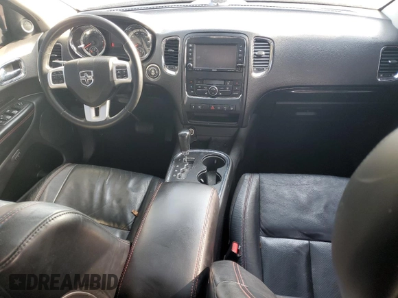 2012 Dodge Durango R/T with VIN 1C4SDHCT3CC188243, listed as a Copart auction lot 40917114 with 145,409 mi miles and Salvage title. Bid and sale history available at DreamBid. Image 8.