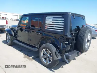 2023 Jeep Wrangler Sahara with VIN 1C4HJXEN5PW508257, listed as a IAAI auction lot 42007569 with 34,990 mi miles and . Bid and sale history available at DreamBid. Image 3.