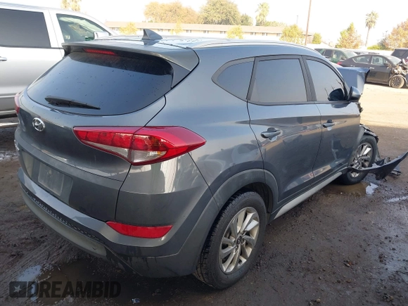 2018 Hyundai Tucson SEL with VIN KM8J33A47JU768935, listed as a IAAI auction lot 41007821 with 125,678 mi miles. Bid and sale history available at carsss.com. Image 4.