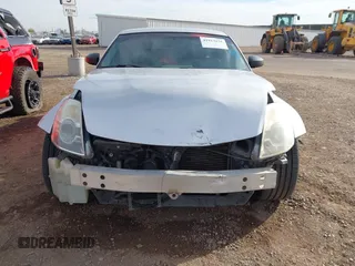 2007 Nissan 350Z Touring z VIN JN1BZ34E87M551658, wystawiony jako IAAI lot #41913235 z przebiegiem 166 786 mil mil oraz . Historia ofert i sprzedaży dostępna na DreamBid. Obrazek 6.