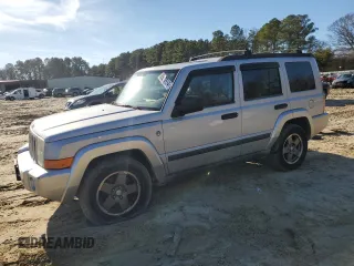2006 Jeep Commander z VIN 1J8HG48N26C155767, wystawiony jako Copart lot #85277654 z przebiegiem 166 693 mil mil oraz Szkody całkowita. Historia ofert i sprzedaży dostępna na DreamBid. Obrazek 1.
