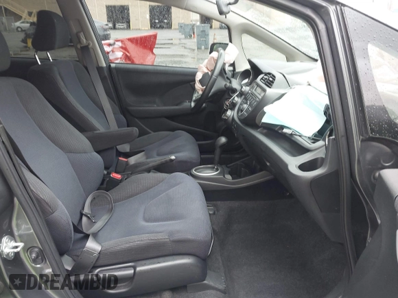 2013 Honda Fit Sport with VIN JHMGE8H52DC018498, listed as a IAAI auction lot 41935157 with 111,922 mi miles. Bid and sale history available at carsss.com. Image 5.