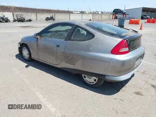 2000 Honda Insight z VIN JHMZE1357YT003654, wystawiony jako IAAI lot #42428076 z przebiegiem 173 445 mil mil oraz . Historia ofert i sprzedaży dostępna na DreamBid. Obrazek 3.