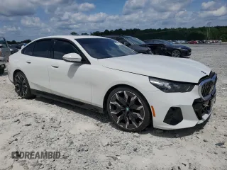 2024 BMW 5 Series 540i xDrive with VIN WBA63FJ04RCS00990, listed as a Copart auction lot 60112415 with Not provided miles and Salvage title. Bid and sale history available at DreamBid. Image 4.