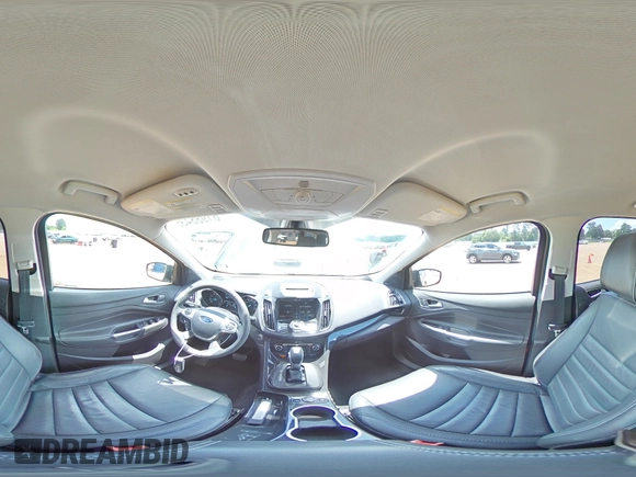 2015 Ford Escape Titanium with VIN 1FMCU0J92FUB80769, listed as a Copart auction lot 61988435 with 103,212 mi miles and Salvage title. Bid and sale history available at DreamBid. Image 15.