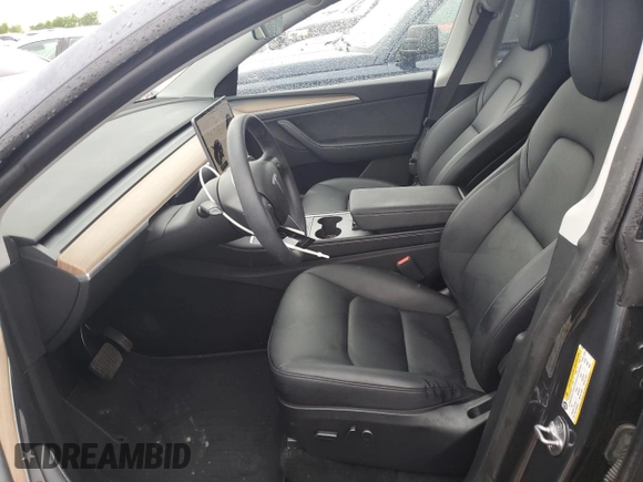 2023 Tesla Model Y Long Range with VIN 7SAYGDEE3PA151887, listed as a Copart auction lot 51459495 with 15,562 mi miles and Salvage Title. Bid and sale history available at DreamBid. Image 7.