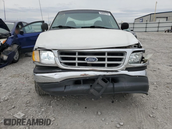 1999 Ford F-150 with VIN 2FTRX17W3XCA68816, listed as a Copart auction lot 53080755 with 201,501 mi miles and Salvage Title. Bid and sale history available at DreamBid. Image 6.
