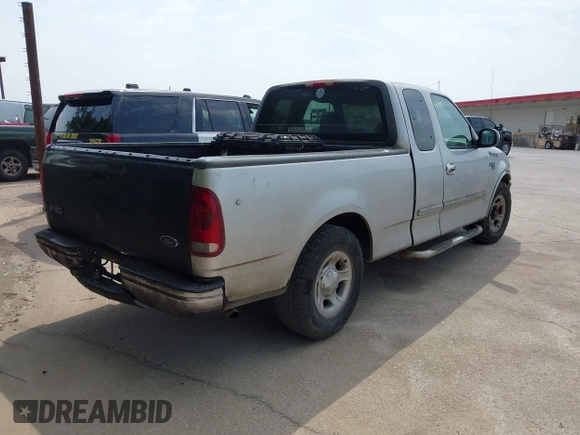 1999 Ford F-150 with VIN 1FTRX17W7XKB20640, listed as a IAAI auction lot 42273497 with 250,232 mi miles and . Bid and sale history available at DreamBid. Image 4.