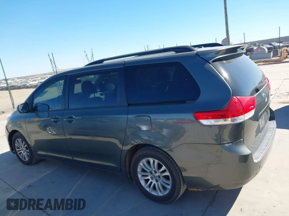 2013 Toyota Sienna XLE AAS with VIN 5TDYK3DCXDS379272, listed as a IAAI auction lot 41407282 with 240,491 mi miles and . Bid and sale history available at carsss.com. Image 14.