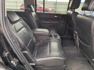 2009 Ford Flex SEL z VIN 2FMEK62CX9BA14490, wystawiony jako Copart lot #58776655 z przebiegiem 214 426 mil mil oraz Szkoda całkowita • Salvage title. Historia ofert i sprzedaży dostępna na DreamBid. Obrazek 11.
