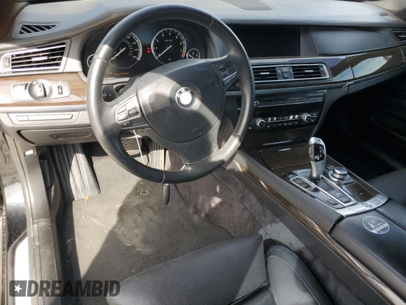 2011 BMW 7 Series with VIN WBAKX8C52BC198377, listed as a Copart auction lot 70003444 with 173,725 mi miles and Salvage title. Bid and sale history available at DreamBid. Image 8.