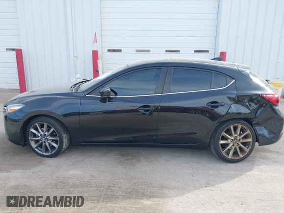 2018 Mazda 3 Touring with VIN 3MZBN1L30JM247097, listed as a IAAI auction lot 41803062 with 61,345 mi miles. Bid and sale history available at carsss.com. Image 14.