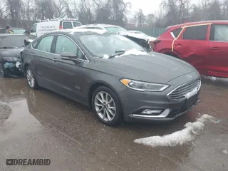2017 Ford Fusion Energi SE with VIN 3FA6P0PU6HR203037, listed as a IAAI auction lot 41567334 with 96,852 mi miles. Bid and sale history available at carsss.com. Image 1.