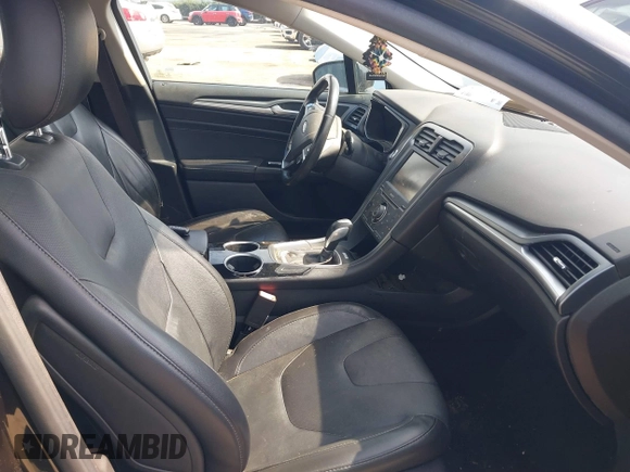 2013 Ford Fusion Titanium Hybrid with VIN 3FA6P0RU7DR355481, listed as a IAAI auction lot 41814003 with 177,789 mi miles. Bid and sale history available at carsss.com. Image 5.