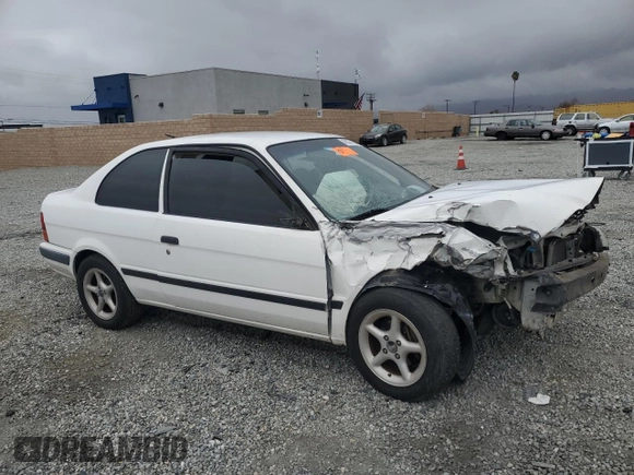 1996 Toyota Tercel DX z VIN JT2AC52L5T0145290, wystawiony jako Copart lot #45027855 z przebiegiem 186 673 mil mil oraz Szkoda całkowita • Salvage title. Historia ofert i sprzedaży dostępna na DreamBid. Obrazek 4.