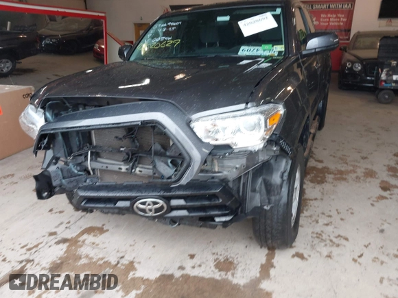 2020 Toyota Tacoma SR with VIN 3TYRX5GN5LT005461, listed as a IAAI auction lot 42020692 with 71,548 mi miles and . Bid and sale history available at DreamBid. Image 6.