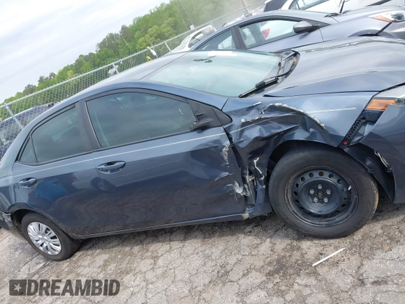 2019 Toyota Corolla L with VIN 5YFBURHE8KP936426, listed as a IAAI auction lot 42029018 with 190,163 mi miles and . Bid and sale history available at DreamBid. Image 13.