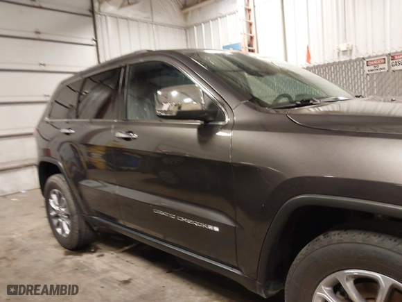 2016 Jeep Grand Cherokee Limited 75th Anniversary with VIN 1C4RJFBGXGC425705, listed as a IAAI auction lot 41779755 with 142,711 mi miles. Bid and sale history available at carsss.com. Image 14.