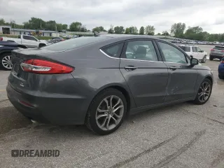 2020 Ford Fusion SEL with VIN 3FA6P0CD8LR195828, listed as a Copart auction lot 55522305 with 163,959 mi miles and Salvage title. Bid and sale history available at DreamBid. Image 3.