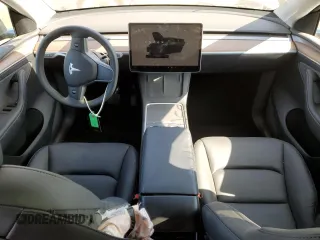 2024 Tesla Model Y with VIN 7SAYGDED7RF163537, listed as a Copart auction lot 48639255 with 7,193 mi miles and Salvage Title. Bid and sale history available at DreamBid. Image 8.