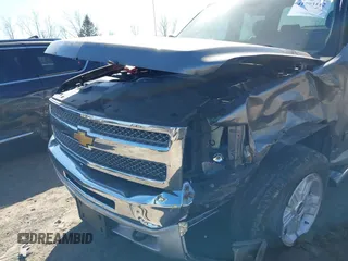 2013 Chevrolet Silverado 1500 LT with VIN 3GCPKSE79DG160065, listed as a IAAI auction lot 41793112 with 112,209 mi miles and . Bid and sale history available at DreamBid. Image 6.