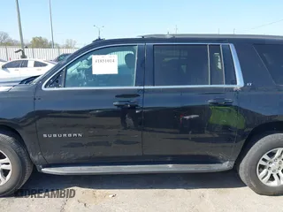 2019 Chevrolet Suburban LT with VIN 1GNSKHKC3KR285095, listed as a IAAI auction lot 41851014 with 151,075 mi miles and . Bid and sale history available at DreamBid. Image 14.