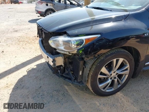 2015 Infiniti QX60 z VIN 5N1AL0MM4FC508869, wystawiony jako IAAI lot #41914059 z przebiegiem 125 389 mil mil oraz . Historia ofert i sprzedaży dostępna na DreamBid. Obrazek 6.