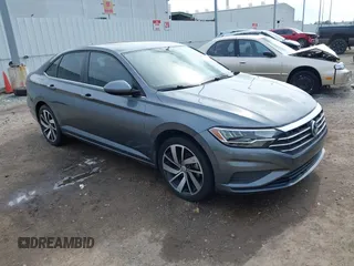 2019 Volkswagen Jetta S z VIN 3VWC57BU6KM147198, wystawiony jako IAAI lot #42420717 z przebiegiem 54 425 mil mil oraz . Historia ofert i sprzedaży dostępna na DreamBid. Obrazek 1.