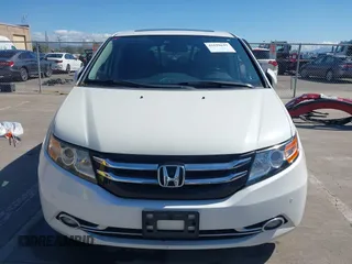 2015 Honda Odyssey Touring Elite with VIN 5FNRL5H91FB038099, listed as a IAAI auction lot 41829649 with 167,017 mi miles and . Bid and sale history available at DreamBid. Image 12.