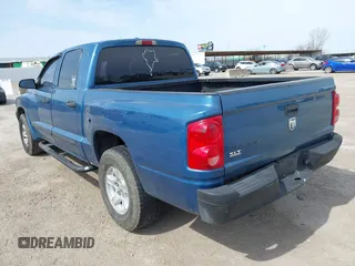 2006 Dodge Dakota SLT with VIN 1D7HE48K96S556831, listed as a IAAI auction lot 41681544 with 236,486 mi miles. Bid and sale history available at carsss.com. Image 3.