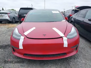 2022 Tesla Model 3 Long Range with VIN 5YJ3E1EB3NF273540, listed as a IAAI auction lot 41978069 with 27,247 mi miles and . Bid and sale history available at DreamBid. Image 13.