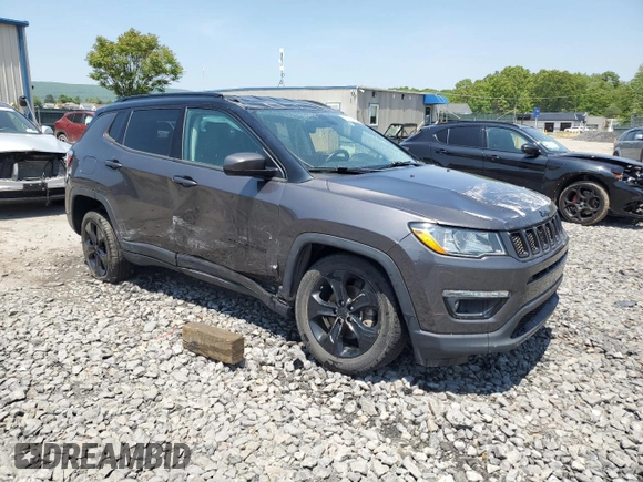 2019 Jeep Compass Altitude with VIN 3C4NJDBB0KT683557, listed as a Copart auction lot 59211055 with 102,648 mi miles and Salvage title. Bid and sale history available at DreamBid. Image 4.