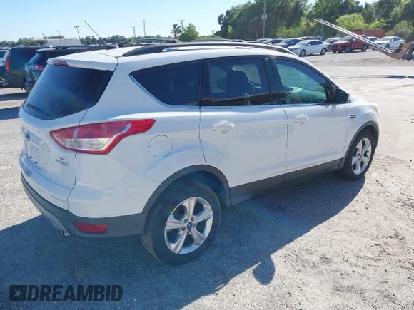 2013 Ford Escape SE with VIN 1FMCU0GX5DUB56405, listed as a IAAI auction lot 41829491 with 165,885 mi miles. Bid and sale history available at carsss.com. Image 4.