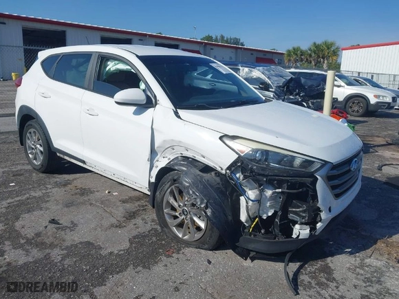 2018 Hyundai Tucson SE with VIN KM8J23A42JU627533, listed as a IAAI auction lot 41880112 with 61,840 mi miles. Bid and sale history available at carsss.com. Image 1.