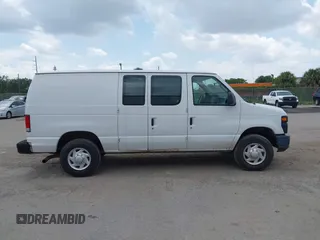 2013 Ford Econoline Cargo Commercial with VIN 1FTSE3EL7DDA87733, listed as a IAAI auction lot 42539015 with 242,027 mi miles and . Bid and sale history available at DreamBid. Image 13.