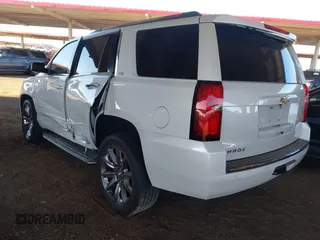 2016 Chevrolet Tahoe LTZ z VIN 1GNSKCKC4GR359442, wystawiony jako IAAI lot #41871814 z przebiegiem 158 533 mil mil oraz . Historia ofert i sprzedaży dostępna na DreamBid. Obrazek 3.